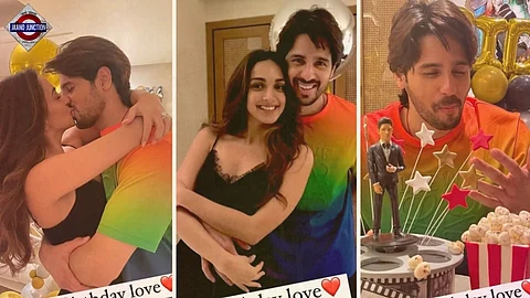 Kiara Advani kisses Sidharth Malhotra on his birthday. Don't miss the 'filmy' cake