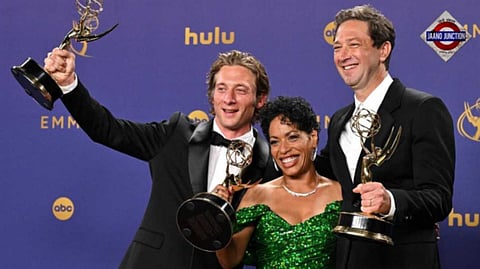 Jeremy Allen White (left), Liza Colón-Zayas and Ebon Moss-Bachrach of The Bear at the 76th Emmy Awards in Los Angeles. /