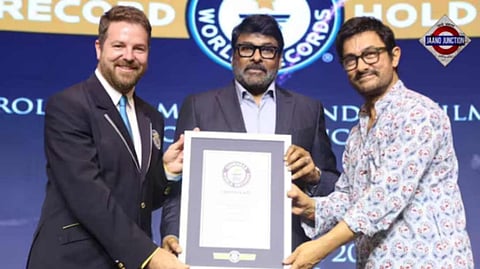 Aamir Khan presents an award to Megastar Chiranjeevi as he sets the Guinness World Record.