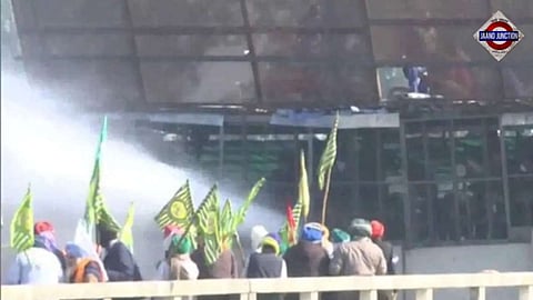 Haryana cops use tear gas, water cannons as farmers try to march to Delhi