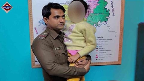 Rescued minor girl with a Bengal Police.
