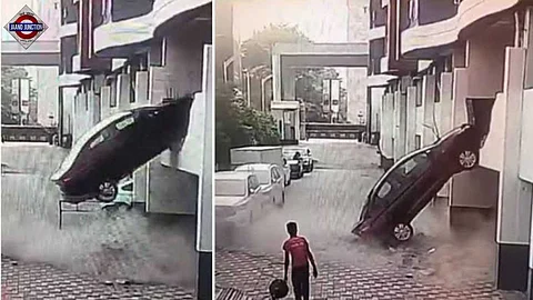Car crashes through wall, falls from first floor parking of Pune apartment.