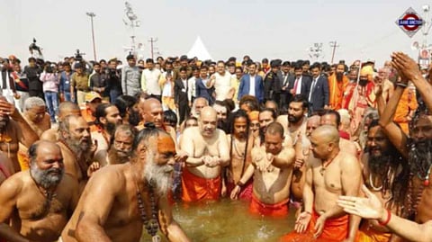 Amit Shah takes holy dip at Maha Kumbh, Ramdev, seers join him