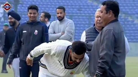 Virat Kohli and coach Rajkumar Sharma at Arun Jaitleuy Stadium.