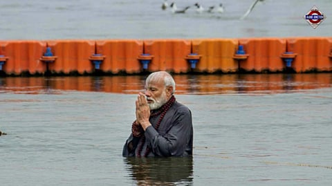 PM Modi to take holy dip at Maha Kumbh tomorrow as Delhi goes to polls