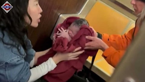 Woman gives birth on New York subway train.