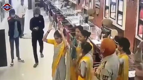 Robbers barged into Tanishq showroom, held customers and staff at gunpoint.