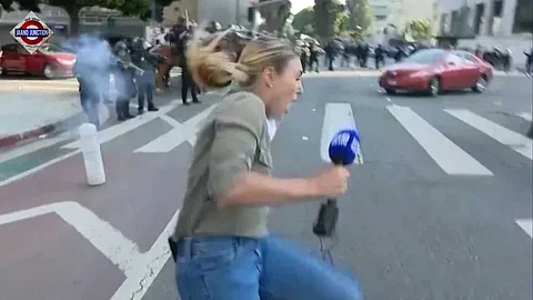 Australian journalist shot by LA police.