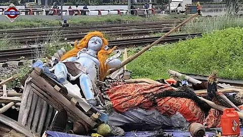 A broken idol of Goddess Durga after a makeshift temple was demolished in Dhaka on Thursday.