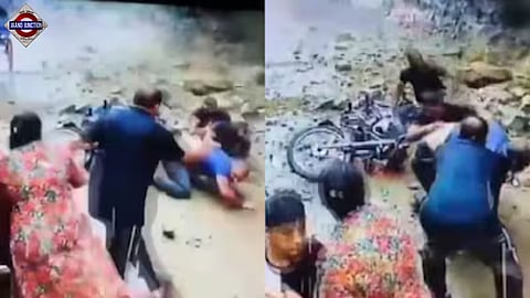 Three youths on bike narrowly escape as landslide debris fall over them in Haridwar.