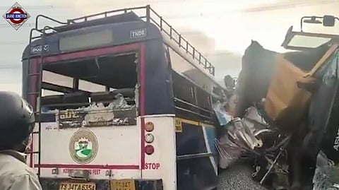 The collision occurred when a speeding truck, reportedly driving on the wrong side of the road, crashed head-on into a TGRTC passenger bus.