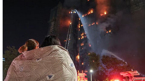 Deaths in Hong Kong high-rise blaze rise to 128 as more bodies recovered