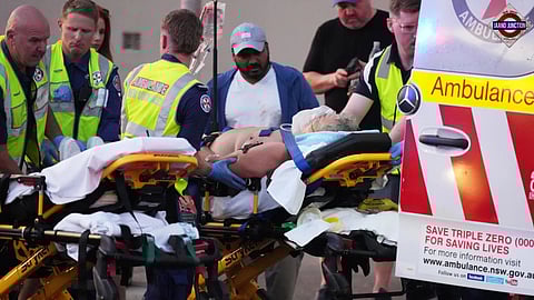 A man is moved on a stretcher after a reported shooting at Bondi Beach in Sydney.