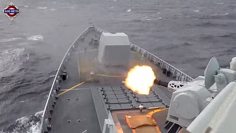A ship fires a weapon during drills east of Taiwan on Monday, December 29.