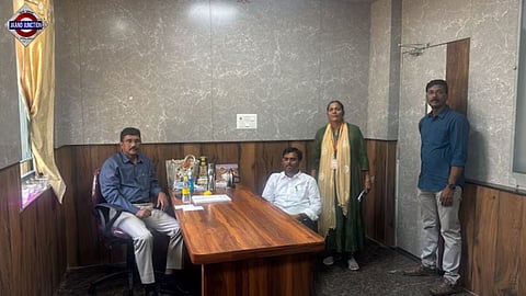 BJP Karnataka MLA Chandru Lamani (in white shirt) was caught after the state Lokayukta Police set up a trap.