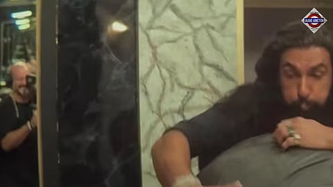 Dhurandhar 2 goes viral after fans spot a cameraman in a mirror scene featuring Ranveer Singh.