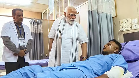 Prime Minister Narendra Modi meets Air India AI-171 crash survivor Vishwas Kumar Ramesh during his treatment following the Ahmedabad plane tragedy that claimed 260 lives.