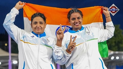 India's Sharmila Dhankar (left) celebrates her historic gold medal in the women's Shot Put F57 alongside bronze medallist Shilpa K. Shyla at the 2026 Commonwealth Games in Glasgow, marking a memorable day for India's para-athletics contingent.
