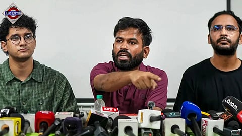 CJP founder Abhijeet Dipke (C) addresses a press conference in Delhi as Saurav Das (L) and Ashutosh Ranka (R) look on.