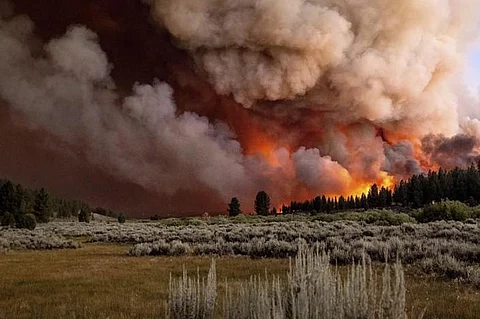 Massive wildfires in California cross into Nevada, enforcing new evacuations