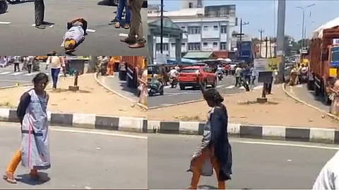 குடித்து விட்டு மொட்டை வெயிலில் சாலையில் படுத்து ரகளை செய்த பெண்!