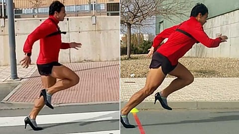 ஹீல்ஸ் அணிந்து 100 மீட்டர் ஓடி உலக சாதனையை முறியடித்த மனிதர்!