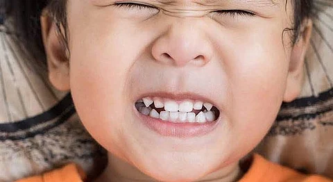 Do you know why children bite their teeth in their sleep?