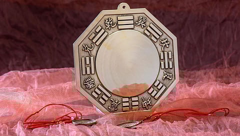 Place the Chinese 'Bagua mirror' at the door of the house