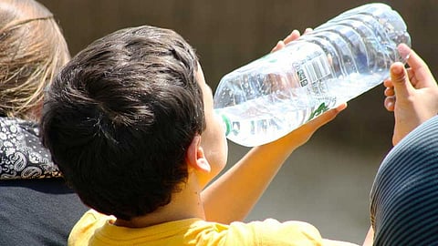 Boy drinking water