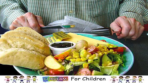 a plate of Healthy foods and a man start to eat