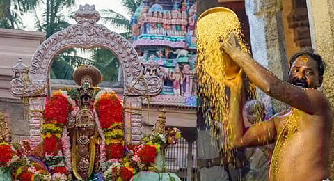 Namperumal with paddy measurement
