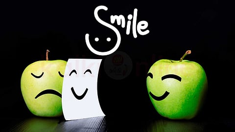 Smiling to hide sadness