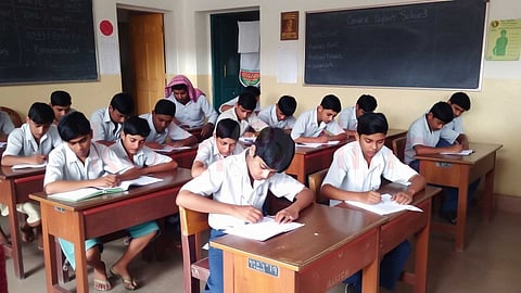 Students Writing Exam