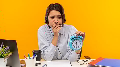 young girl sitting in table for work