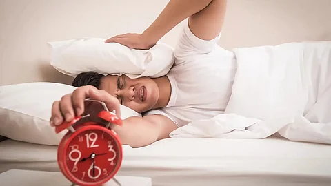 Alarm snoozing in sleep