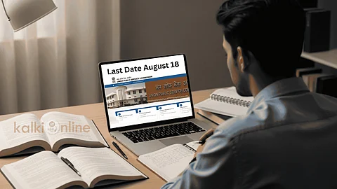 A Guy studying at a desk with a laptop showing UPSC.