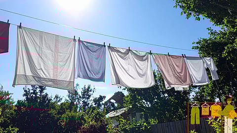 how to dry clothes indoors