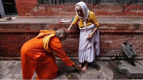 Is falling at someone's feet a virtuous act or a sin?