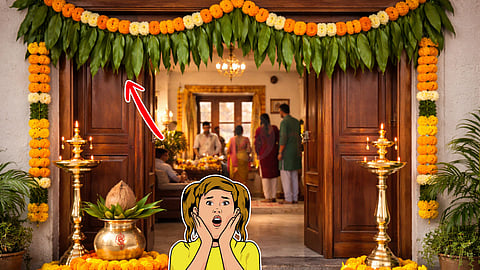 A garland of mango leaves has been hung at the entrance of the new house