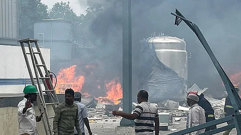 Flames erupted immediately, engulfing parts of the factory.