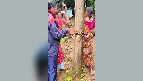 Elderly woman tied to pole, assaulted