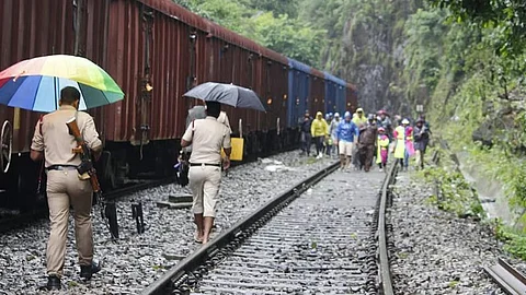 The RPF officials sending back a group of tourists at Dudhsagar railway station.