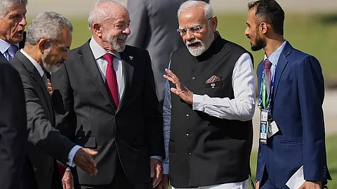 PM Modi, second from right, chats with Brazilian President Luiz Inacio Lula da Silva during the 17th annual BRICS summit in Rio de Janeiro, Sunday, July 6, 2025.
