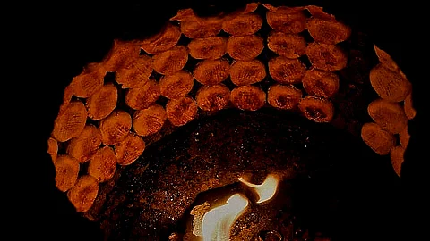 Heart of the Kandur-Waan: Rows of Girda cling to the inner walls of the tandoor (Oven).