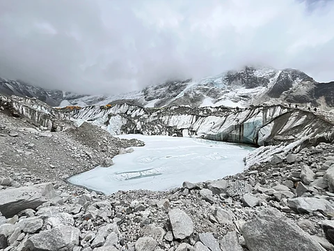 Glaciers and glacial lakes are wetlands which are threatened due to global warming.