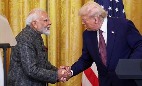 Prime Minister Narendra Modi and US President Donald Trump shake hands as they attend a joint press conference at the White House in Washington, DC, on February 13, 2025.
