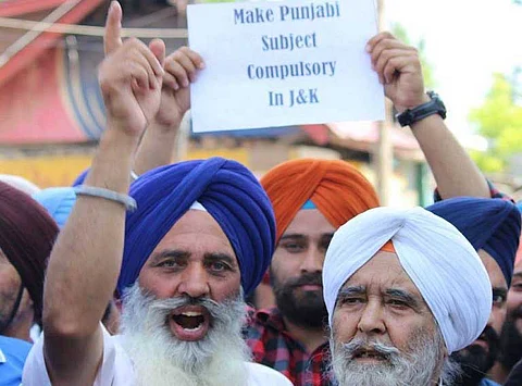 A file photo of Sikh community members' protest in Kashmir.