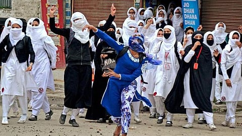 A file photo of young Kashmiri women protesting on Srinagar streets.