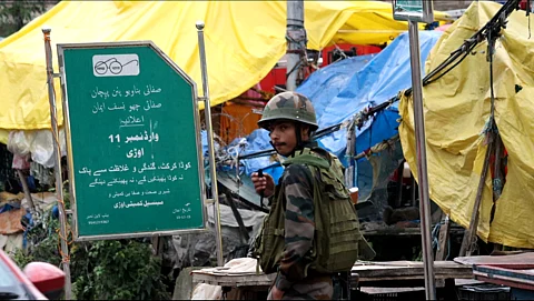 An Army man patrolling the Uri town near Line of Control in Baramulla district of Kashmir Valley in May before the ceasefire was reached between India and Pakistan.