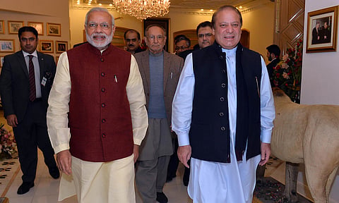 Narendra Modi made a surprise visit to Pakistan to meet his counterpart Nawaz Sharif.